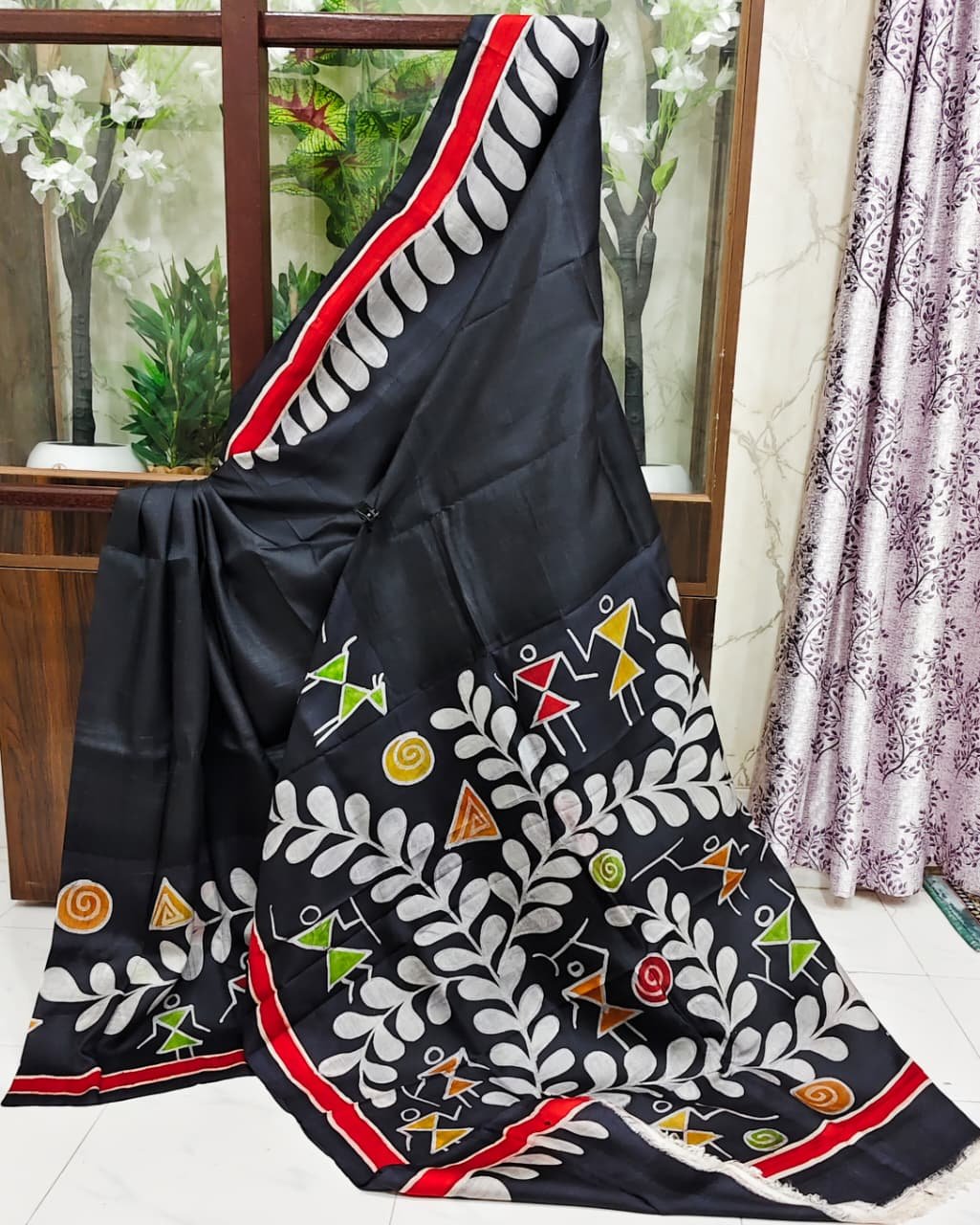Black sari with hand-painted Warli tribal art border
